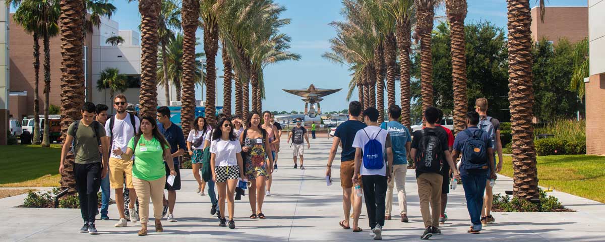People walk on the Legacy Walk.