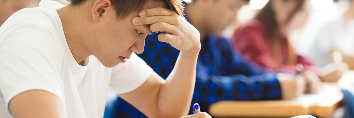 an asian student studies
