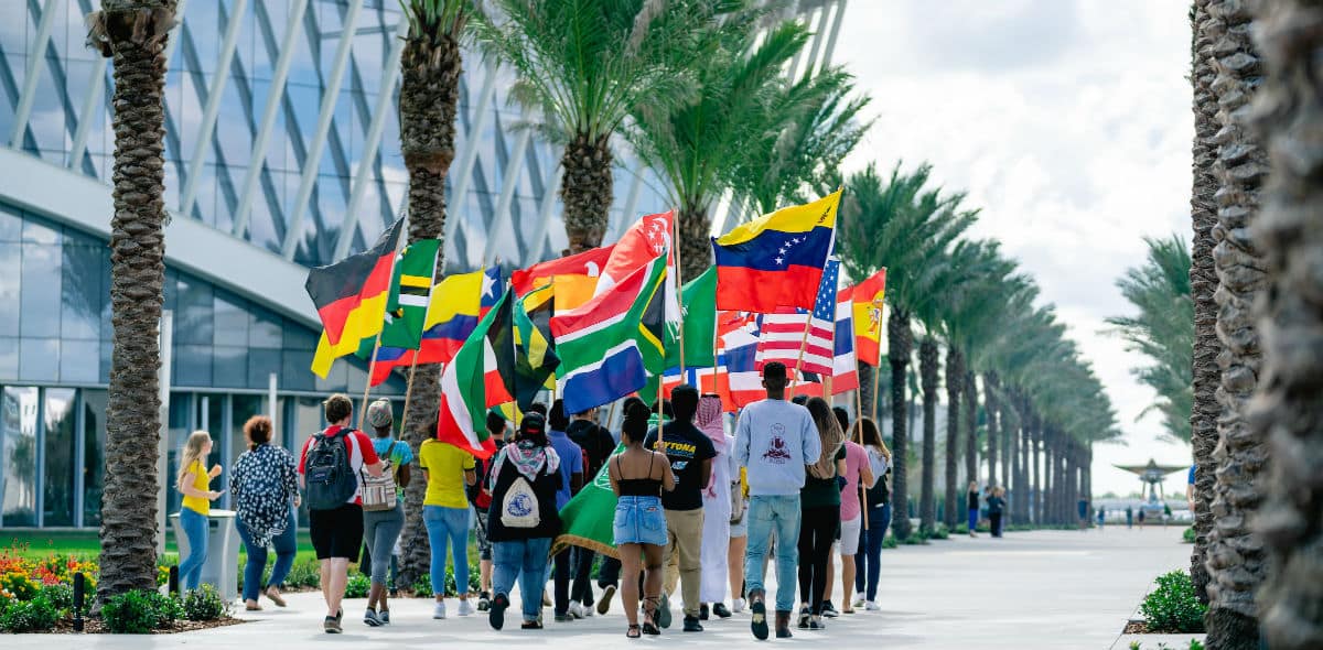 International students performing a flag parade