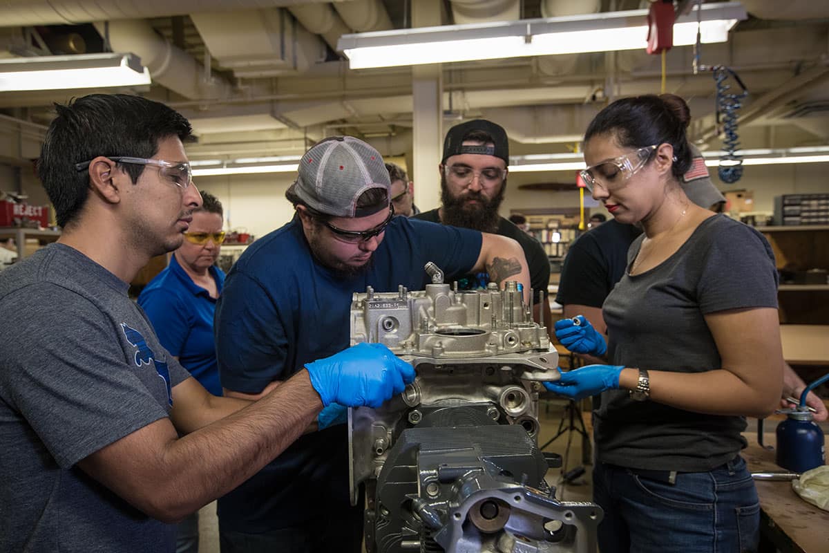 Students work in the Chandler Titus Repair Station Operations Lab in the Aviation Maintenance Science Department