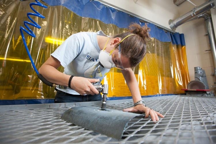 A student works on a project in the Composites Lab