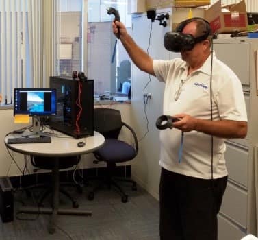 a student testing VR equipment