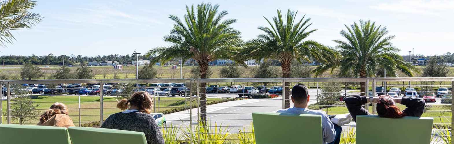 Students relax on the terrace.