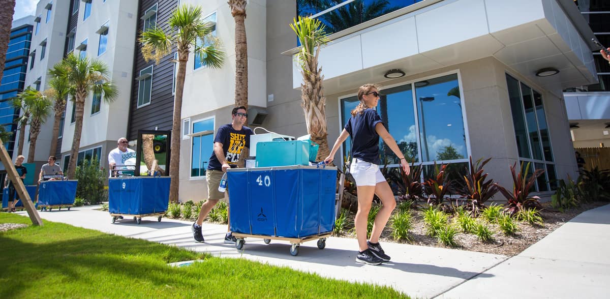 Student move into the new residence hall.