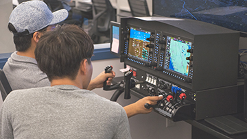 Embry-Riddle flight students practice on the Redbird Xwind SE Crosswind Training simulation device.