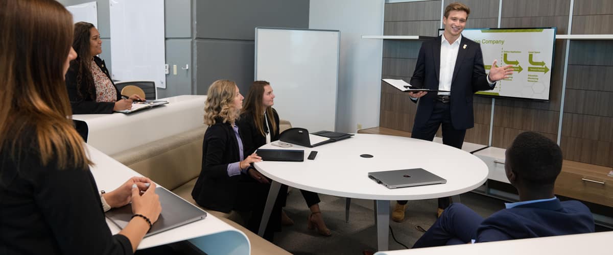 Man presents to a group at the MicaPlex.