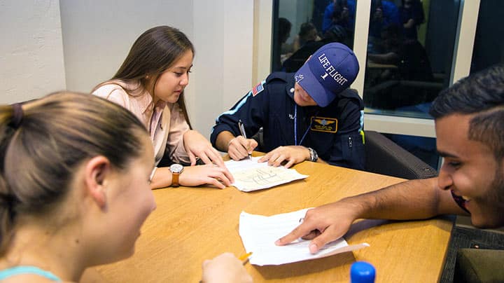 Students around a table