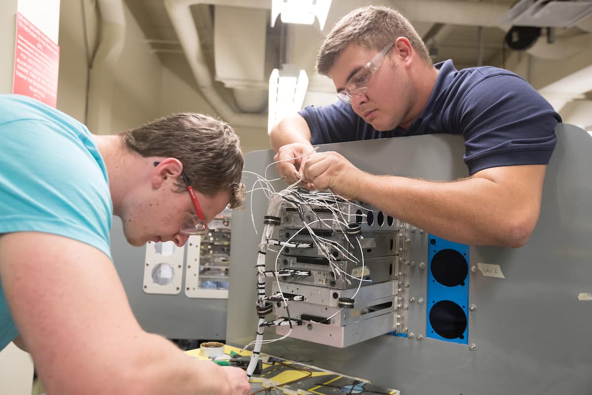 Students work on aircraft electronics in the Avionics Lab