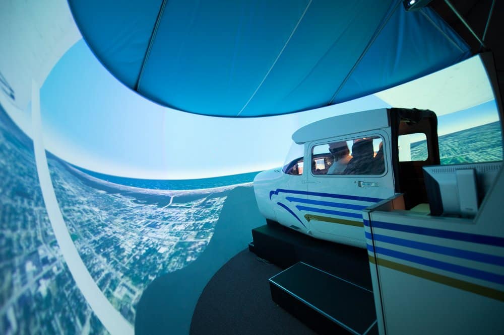 students in the Advanced Flight Simulation Center