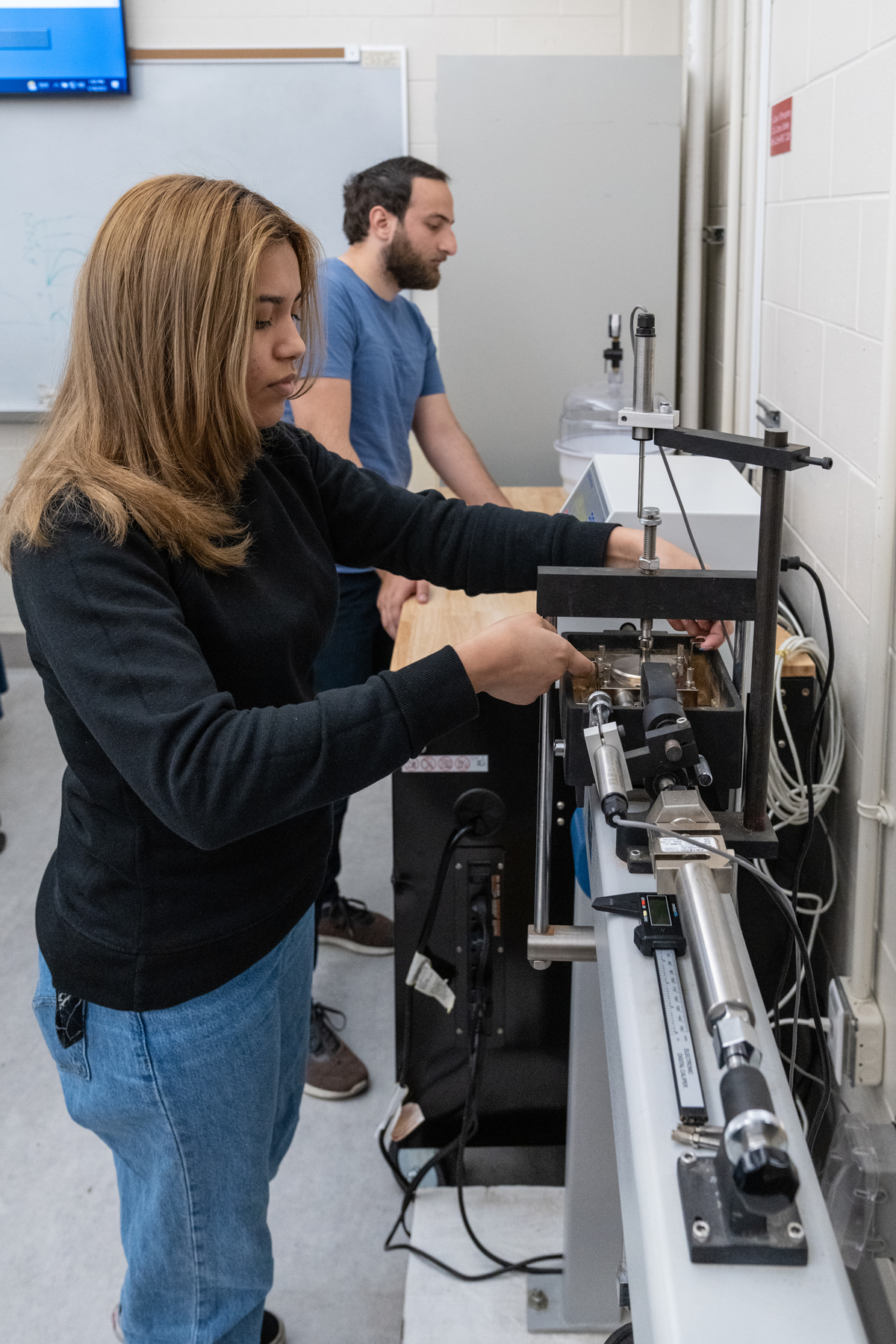 Student works on an experiment in the Advanced Geotechnical Laboratory