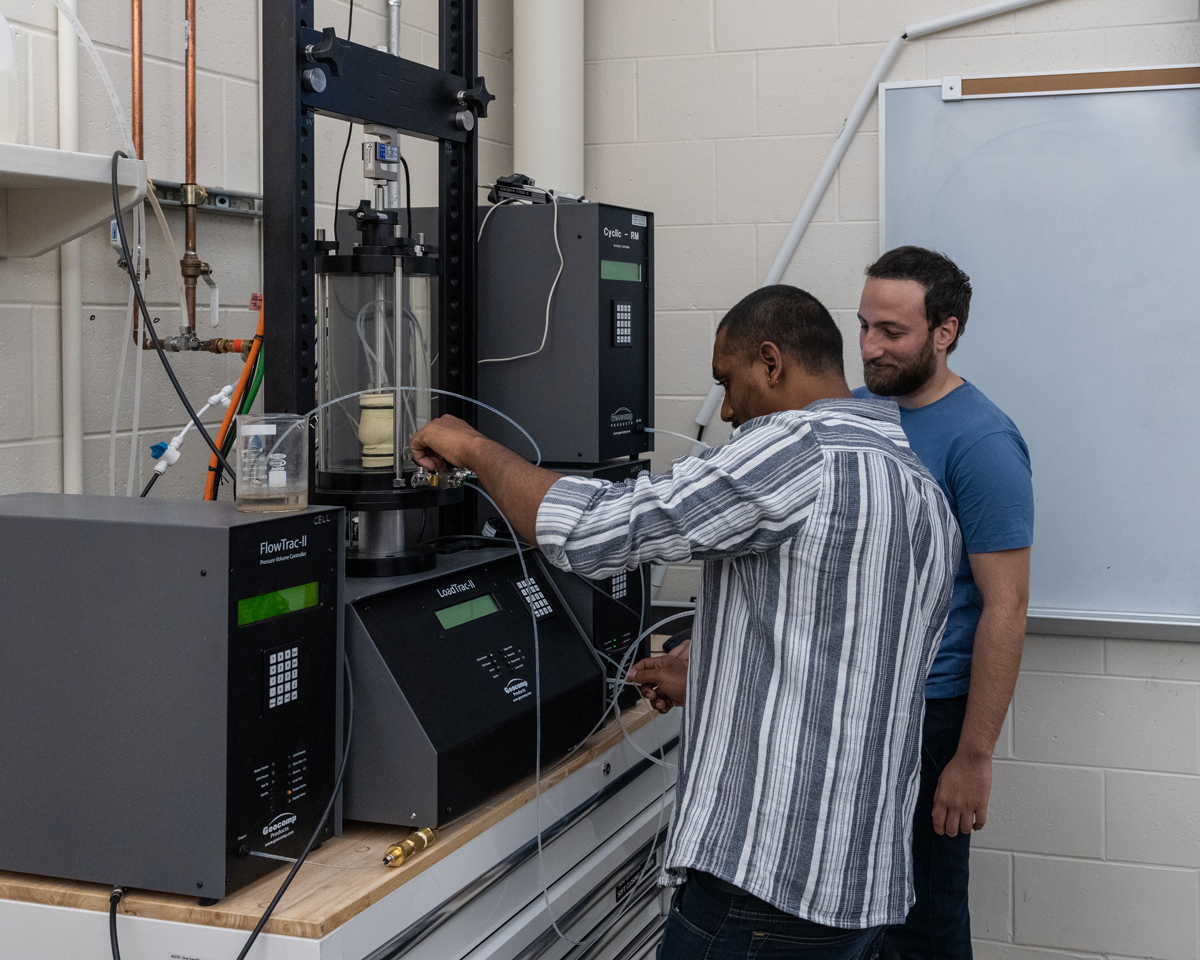 Two male students in the Advanced Geotechnical Laboratory