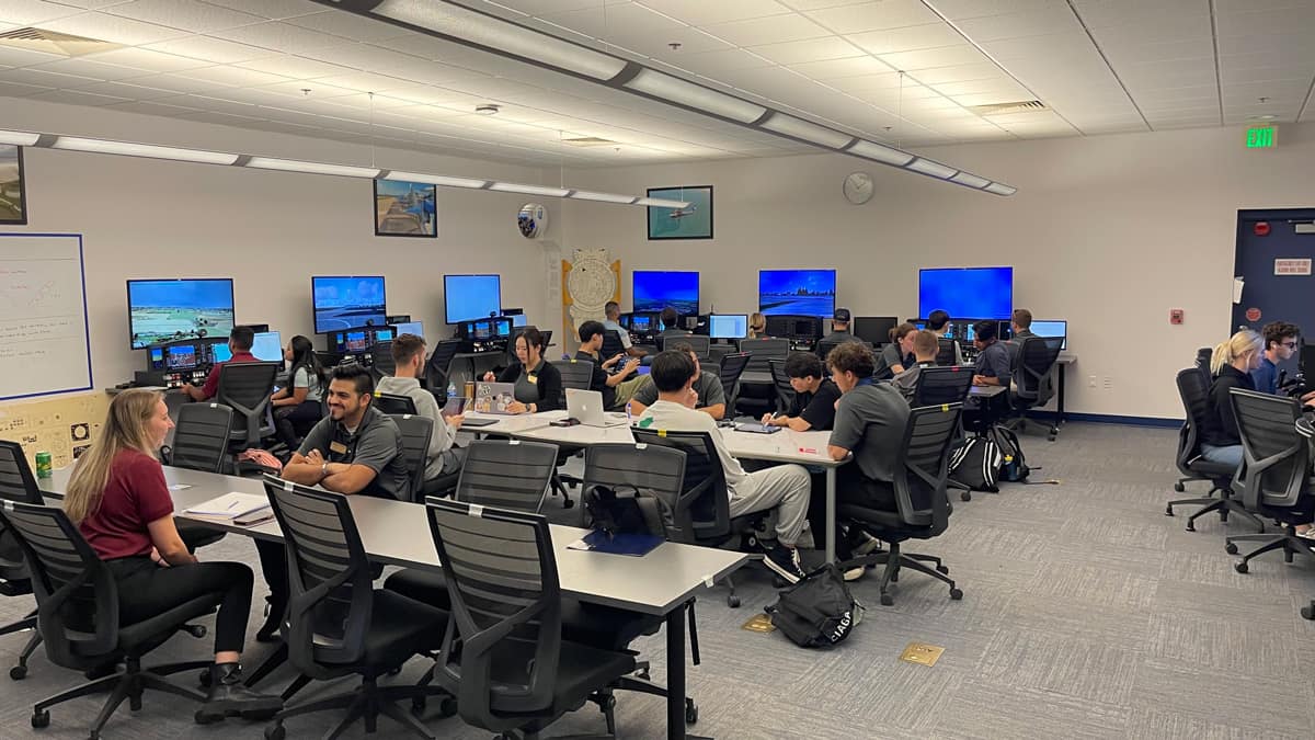 Students and Faculty collaborate at the Aviation Learning Center.