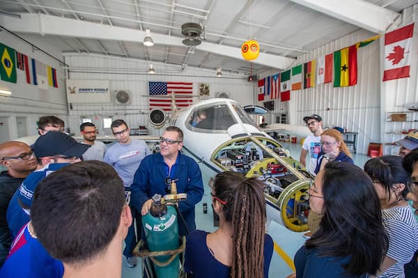 Students work on plane in AMS Hangar