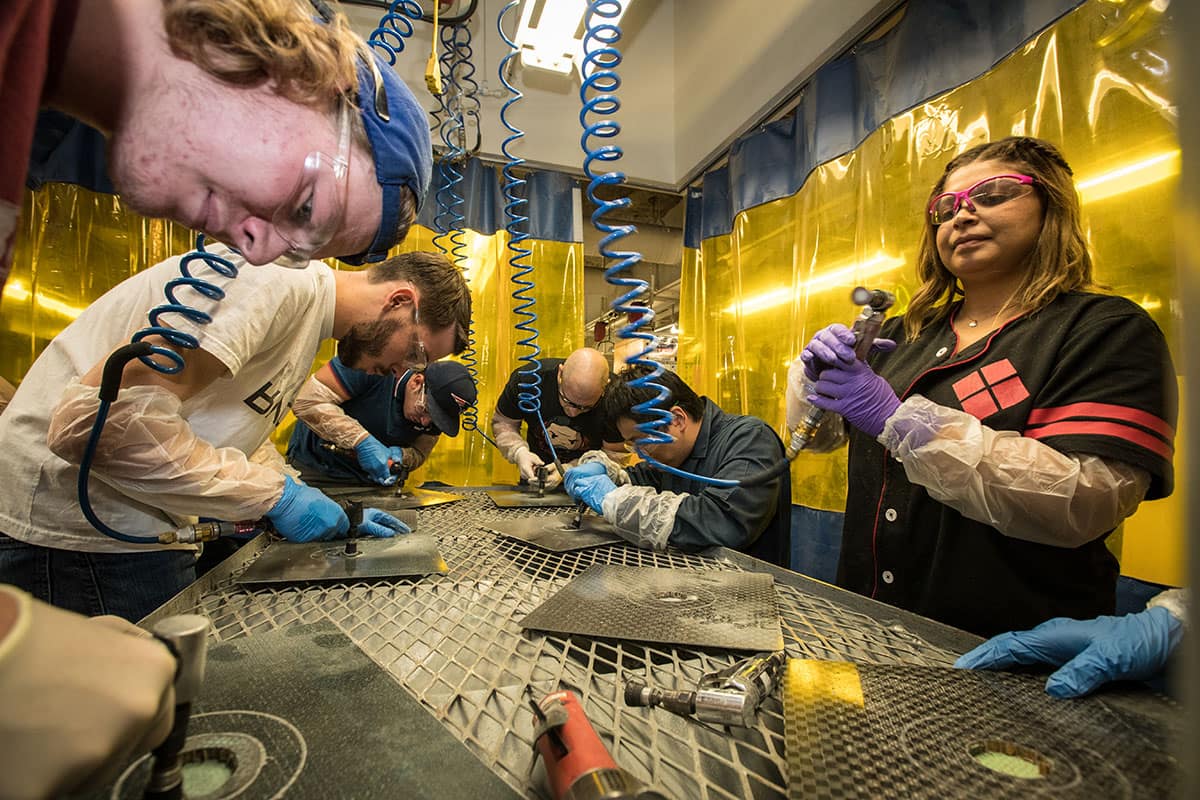 Students work on aircraft structures and materials an Aircraft Composite Structures Lab in the Aviation Maintenance Science Department