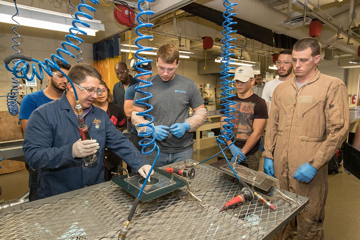 Students work in the Aircraft Composite Structures in the Aviation Maintenance Science Department