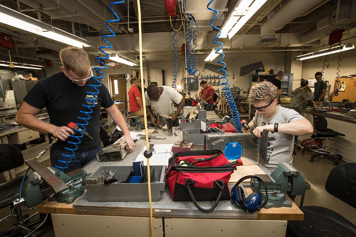 Students work on projects in the Aircraft Metallic Structures Lab for the Aviation Maintenence Science degree in the College of Aviation