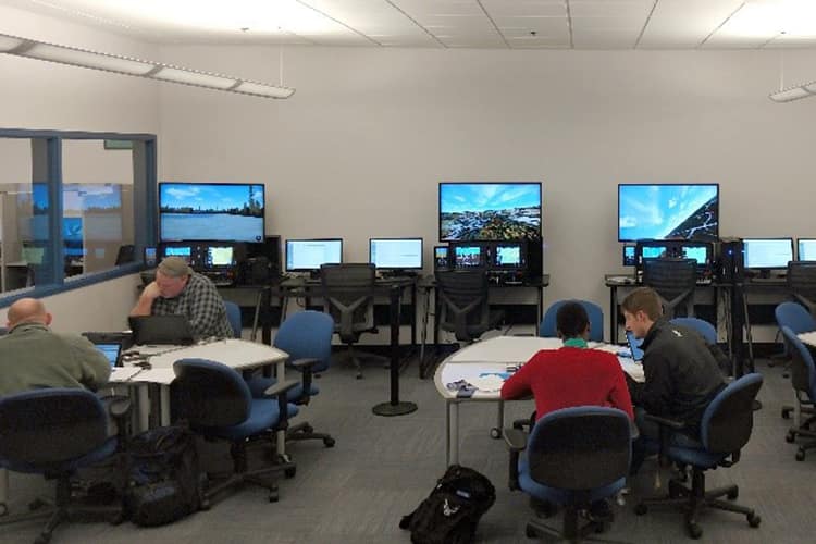 Students work in groups at the Aviation Learning Center.