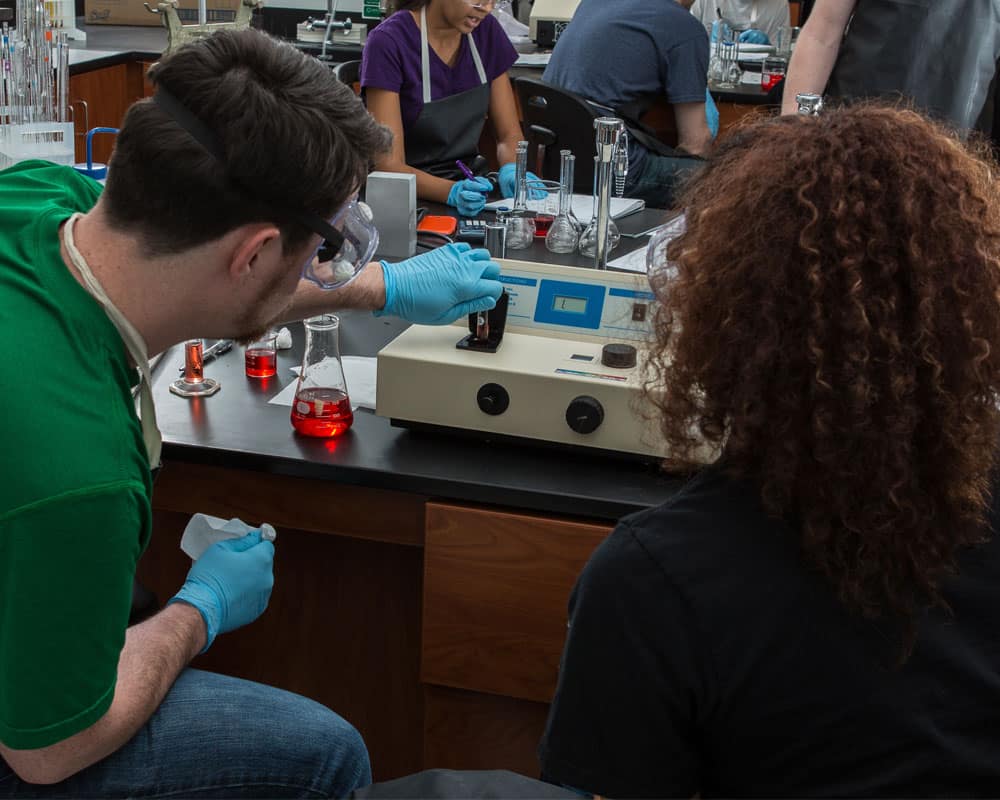 Students test liquids in the Chemistry Lab