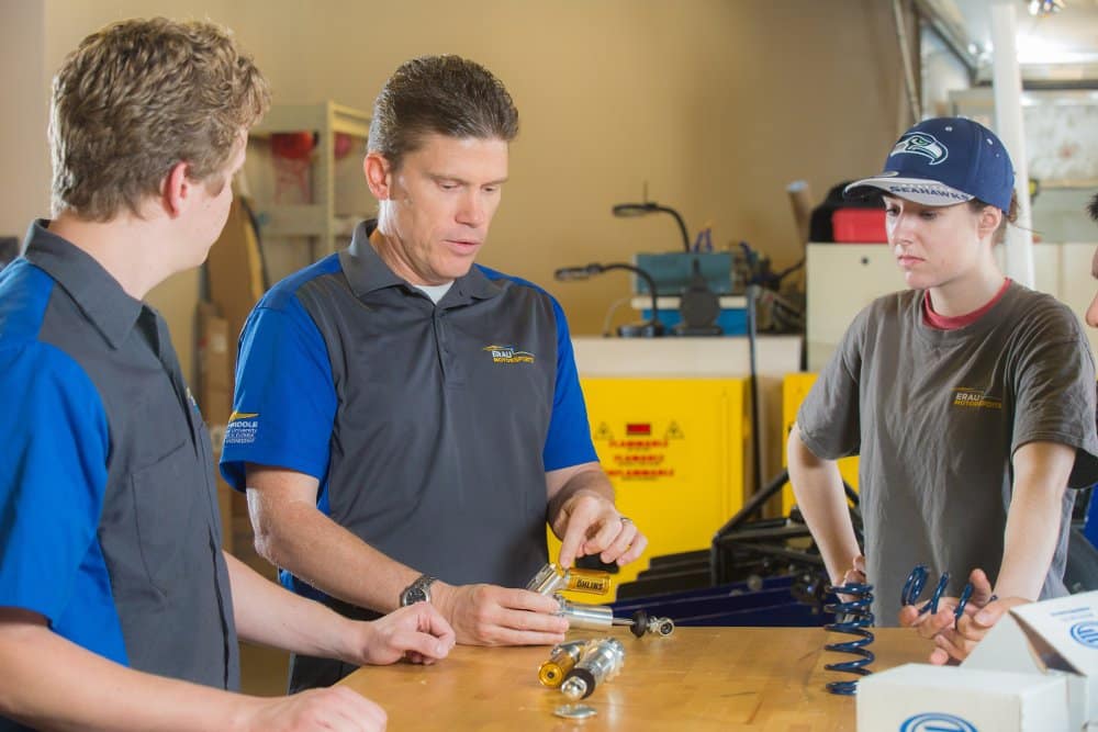 Faculty and students discuss at project at the Center for Motorsports Engineering