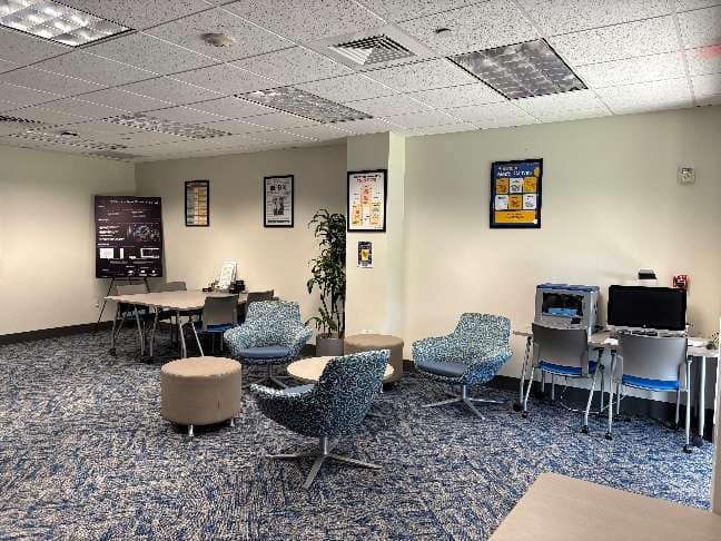 Entrepreneurship Lab with desks and TVs