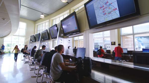 Students sitting at desks in the Flight Operations Center.