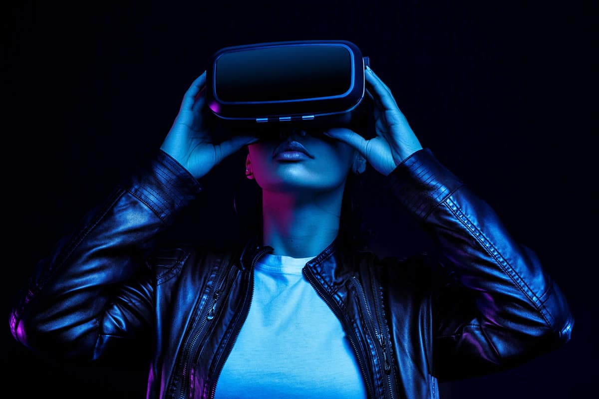 Woman wears a virtual reality headset.