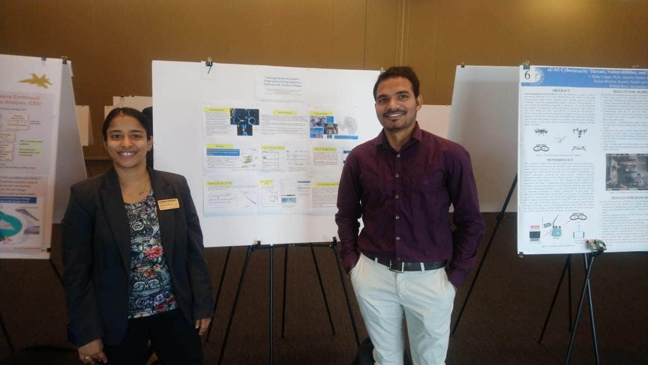 Students with poster for Discovery Day