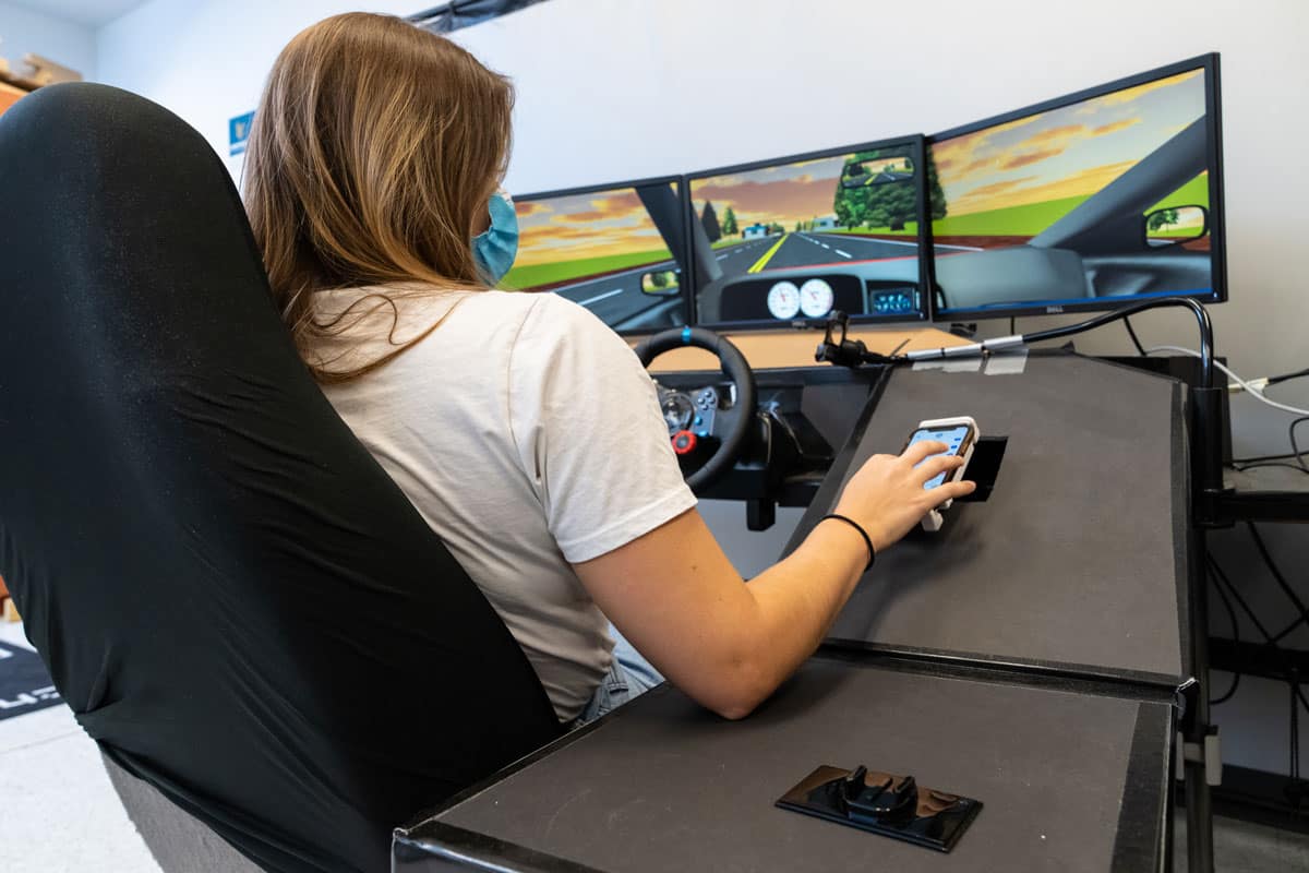 Student uses a flight simulator