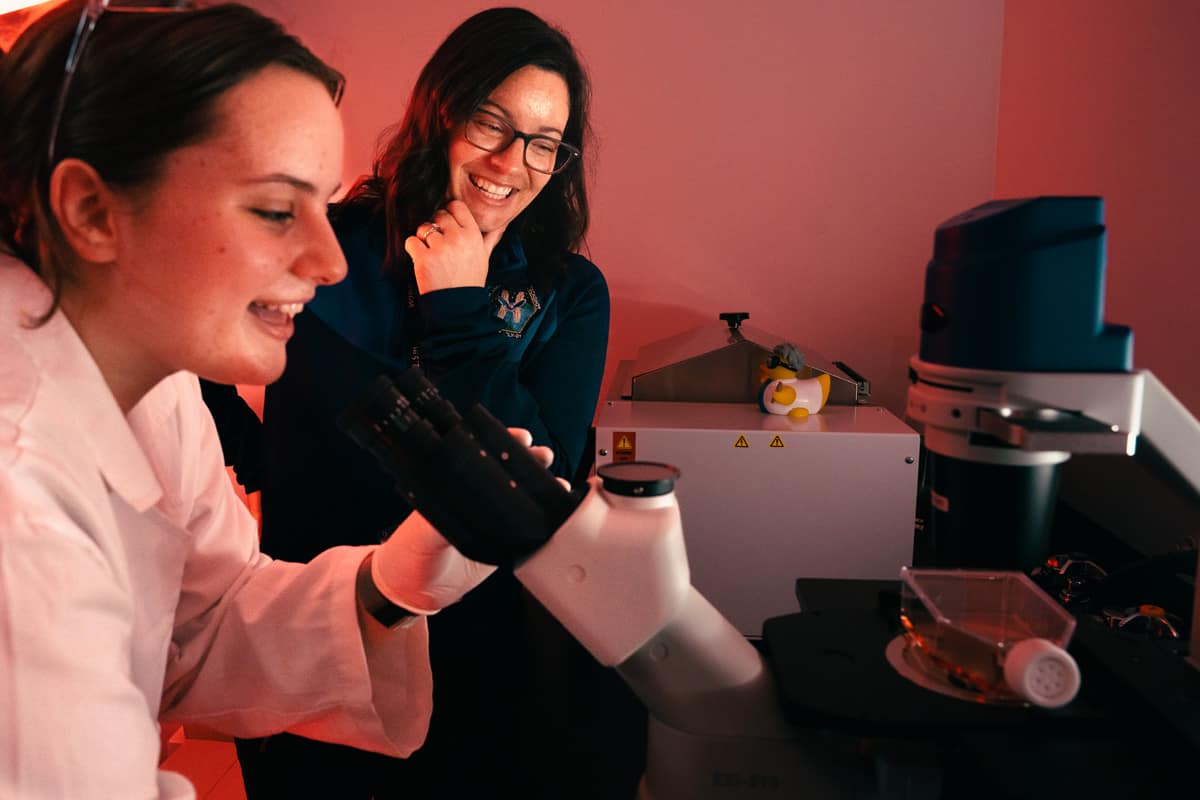 Omics Lab Director Dr. Amber Paul shares a light moment with student Angela Cebula in Embry-Riddle’s Omics Lab. (Photo: Embry-Riddle / Bill Fredette-Huffman)