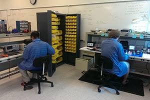 Researchers work in the lab