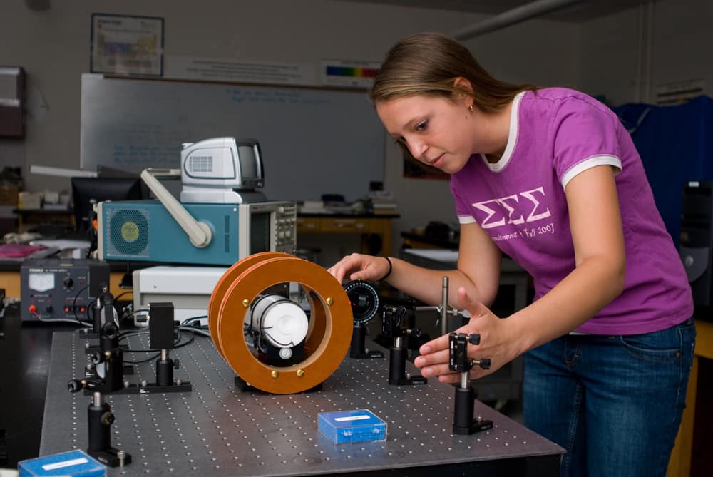 A student works on an experiment in the Space Physics Research Lab