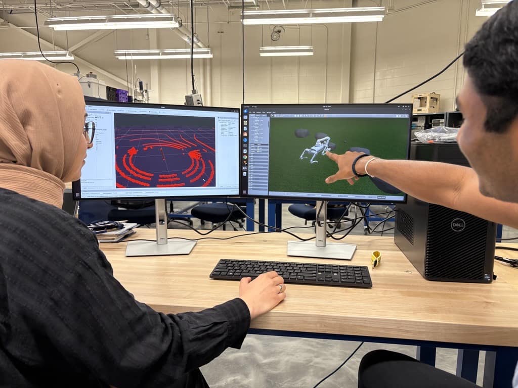 Student working on robotic simulator