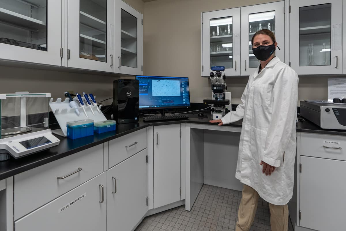 Civil Engineering undergraduate student Devonne Friday conducts microplastics research in the Sustainability and Environmental Engineering Laboratory.