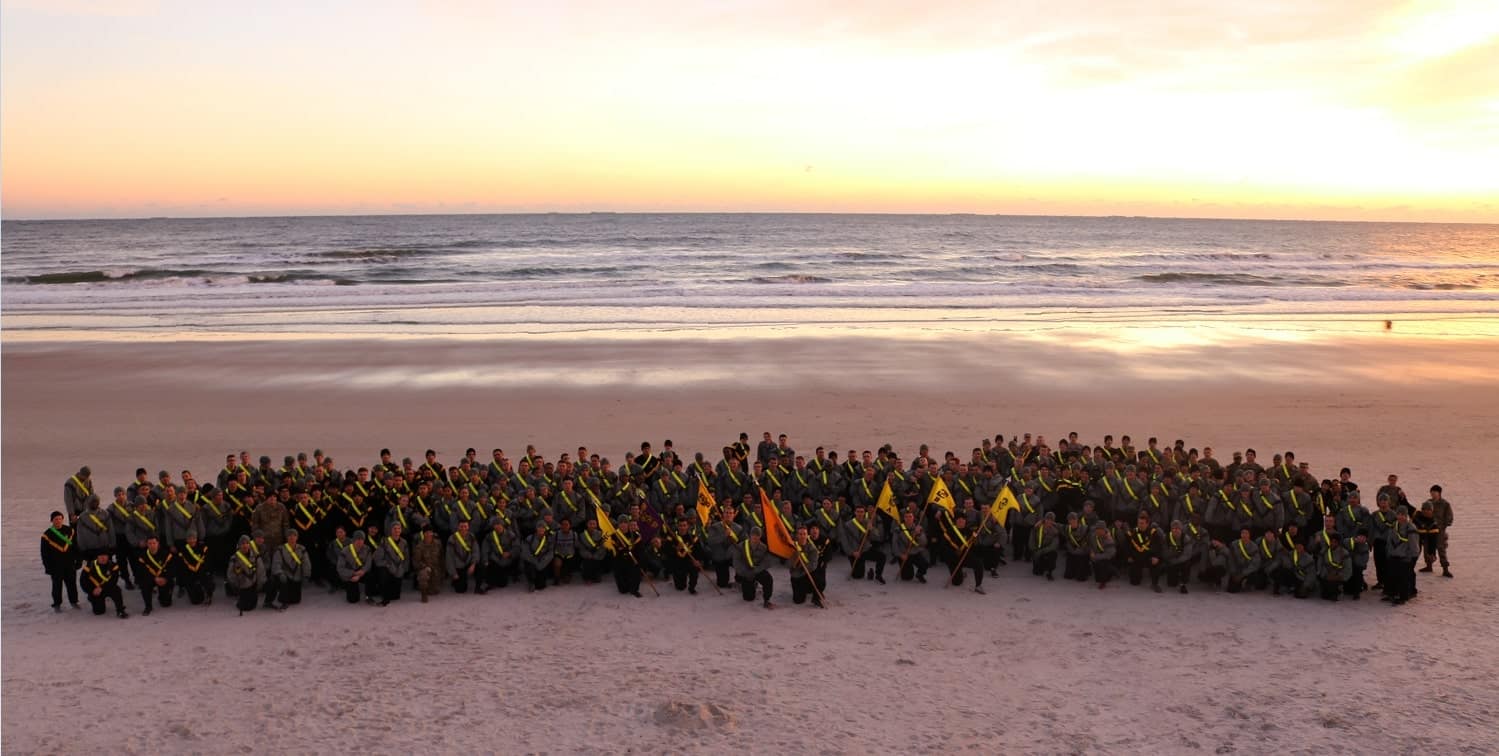 army ROTC gathered on a beach