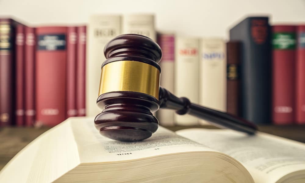 Gavel on books.