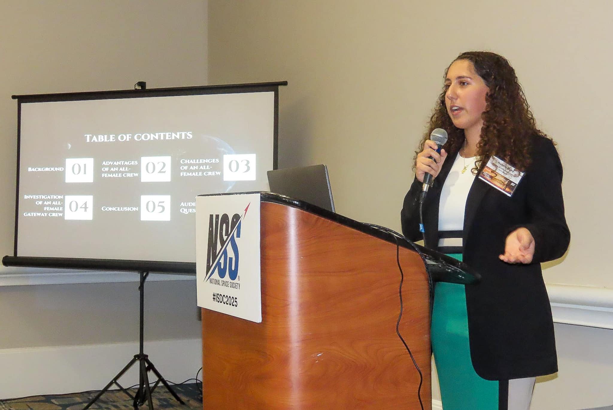 Natalie Byrd speaks by a podium
