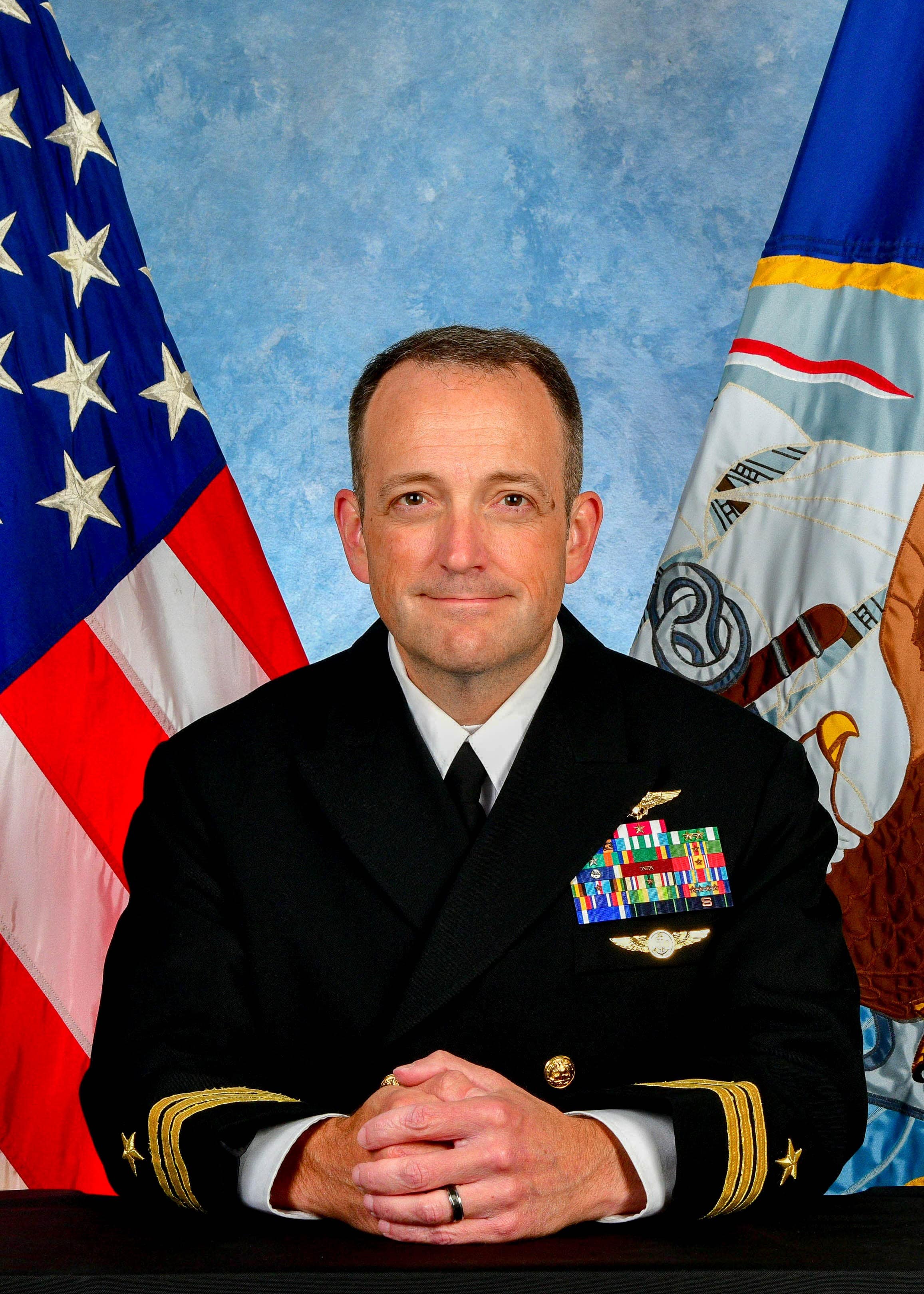 Headshot of Commander Matthew D. Woods